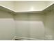 Walk-in closet with ample storage space and laminate floors at 109 Bee Tree Ln, Salisbury, NC 28144