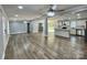 Open concept living space featuring recessed lights, wood floors, and a view into the kitchen at 109 Bee Tree Ln, Salisbury, NC 28144
