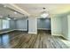 Spacious living room with wood floors, neutral walls, and an open layout for comfortable living at 109 Bee Tree Ln, Salisbury, NC 28144