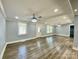 Spacious open-concept living room with recessed lighting and wood floors at 109 Bee Tree Ln, Salisbury, NC 28144
