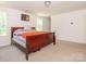Bright bedroom with large windows and neutral carpet, perfect for relaxation and rest at 11010 Redcoat Hill Ln # 33, Huntersville, NC 28078