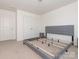 Spacious bedroom with ample closet space, perfect for creating a personalized and organized retreat at 11010 Redcoat Hill Ln # 33, Huntersville, NC 28078