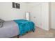 Cozy bedroom with carpet, closet, mirror and ample natural light at 11010 Redcoat Hill Ln # 33, Huntersville, NC 28078