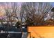 City skyline peeks through the trees, offering a tranquil yet urban backdrop to the property at 1115 Greenleaf Ave # B, Charlotte, NC 28202