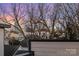Enjoy the amazing city views from this home, framed by beautiful trees and rooftops at 1115 Greenleaf Ave # B, Charlotte, NC 28202