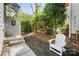 Inviting front yard with manicured landscaping and a cozy seating area at 1115 Greenleaf Ave # B, Charlotte, NC 28202