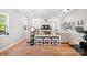 Inviting living room featuring a large table, bar stools, and a spacious seating area at 1115 Greenleaf Ave # B, Charlotte, NC 28202
