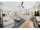 Spacious living room with a large sectional sofa, modern decor, and ample natural light at 1115 Greenleaf Ave # B, Charlotte, NC 28202