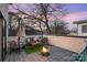 Inviting rooftop deck featuring a cozy fire pit, comfortable seating, and a relaxing atmosphere for outdoor enjoyment at 1115 Greenleaf Ave # B, Charlotte, NC 28202