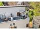 Relaxing rooftop deck with outdoor seating, umbrella, and views at 1115 Greenleaf Ave # B, Charlotte, NC 28202