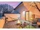 Cozy rooftop deck with a fire pit, stylish seating, and soft lighting perfect for evening gatherings and relaxation at 1115 Greenleaf Ave # B, Charlotte, NC 28202