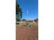 Landscaped memorial featuring an American flag, set against a clear blue sky at 124 Canary Ln # 7, Mooresville, NC 28115
