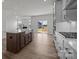 Modern kitchen with a large island, stainless steel appliances, and a view into the living room at 124 Canary Ln # 7, Mooresville, NC 28115