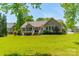 Spacious backyard featuring a deck and ample lawn space, perfect for outdoor activities and entertaining at 1374 Weatherby Dr, Salisbury, NC 28146