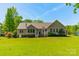 Back exterior featuring a deck with white railing and windows at 1374 Weatherby Dr, Salisbury, NC 28146