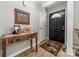 Welcoming entryway with stylish decor, wood flooring, and plenty of natural light at 1374 Weatherby Dr, Salisbury, NC 28146