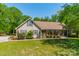 Charming ranch-style home with well-maintained lawn and inviting front porch at 1374 Weatherby Dr, Salisbury, NC 28146