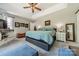 This main bedroom features an en-suite bath, tray ceiling, and plenty of natural light at 1374 Weatherby Dr, Salisbury, NC 28146