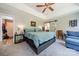 Large main bedroom with sitting area, tray ceilings, and en-suite bath with sliding barn door at 1374 Weatherby Dr, Salisbury, NC 28146