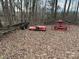 The backyard features farm equipment at 14131 Lucia Riverbend Hwy, Mount Holly, NC 28120