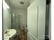 Bathroom featuring a corner shower and a toilet at 14131 Lucia Riverbend Hwy, Mount Holly, NC 28120