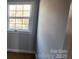 Bedroom featuring neutral walls and a window providing ample natural light at 14131 Lucia Riverbend Hwy, Mount Holly, NC 28120