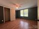 Bedroom with closet, hard floors and large window for natural light at 143 Ezra Rd, Kings Mountain, NC 28086