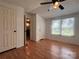Bright bedroom with hard floors and large window for natural light at 143 Ezra Rd, Kings Mountain, NC 28086