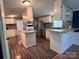 Well-equipped kitchen with white cabinets and stainless steel appliances at 143 Ezra Rd, Kings Mountain, NC 28086