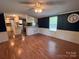 Bright living room with laminate flooring and neutral color palette at 143 Ezra Rd, Kings Mountain, NC 28086