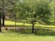Mature yard with swing set and mature trees at 143 Ezra Rd, Kings Mountain, NC 28086
