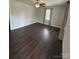 Bright and airy living room features sleek floors, a ceiling fan, and natural light at 155 Ervin Loop, China Grove, NC 28023