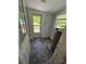 This utility room features durable flooring and a tank water heater near the door to the backyard deck at 155 Ervin Loop, China Grove, NC 28023