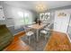 Stylish dining room featuring new lighting, furniture and decor at 1620 Moss Springs Rd, Albemarle, NC 28001