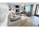 Bright living room with fireplace, built-in shelves and hardwood floors at 1620 Moss Springs Rd, Albemarle, NC 28001