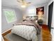 Cozy main bedroom with hardwood floors, natural light and closet at 1620 Moss Springs Rd, Albemarle, NC 28001