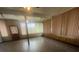 Sunroom with large windows and tiled floor, offering versatile space with natural light at 1620 Moss Springs Rd, Albemarle, NC 28001