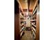 Unfinished basement with wooden shelves provides ample storage space at 1684 Montevista Dr, Shelby, NC 28150