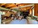 Unfinished basement with wood ceilings, concrete floors, and a utility sink at 1684 Montevista Dr, Shelby, NC 28150