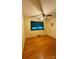 Bedroom featuring hardwood floors, a ceiling fan, and a window with curtains at 1684 Montevista Dr, Shelby, NC 28150