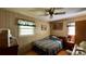 Bedroom with a window and wood-paneled wall at 1684 Montevista Dr, Shelby, NC 28150
