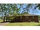 Charming brick home featuring a covered parking area and well-maintained front lawn at 1684 Montevista Dr, Shelby, NC 28150
