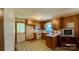 Functional kitchen with vintage-style cabinetry and appliances at 1684 Montevista Dr, Shelby, NC 28150