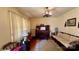 Cozy living room featuring a piano, seating, and large windows offering natural light at 1684 Montevista Dr, Shelby, NC 28150