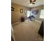 Bedroom featuring neutral carpet, natural light, and wall decor at 1905 Yellow Daisy Dr, Matthews, NC 28104