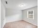 Bedroom with natural light and wood-look floors throughout at 218 Valleybrook Ln, Troutman, NC 28166