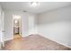 Bedroom with doorway to bathroom and wood-look floors at 218 Valleybrook Ln, Troutman, NC 28166