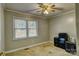 Bedroom with neutral paint, standard window and ceiling fan at 221 Delview Dr, Cherryville, NC 28021