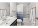 Bathroom with shower and bathtub combination and a sleek vanity with towels at 2333 Talon Point Cir, Fort Mill, SC 29715