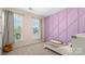Bright bedroom with decorative trim, plush carpet, and sunlit windows at 2333 Talon Point Cir, Fort Mill, SC 29715